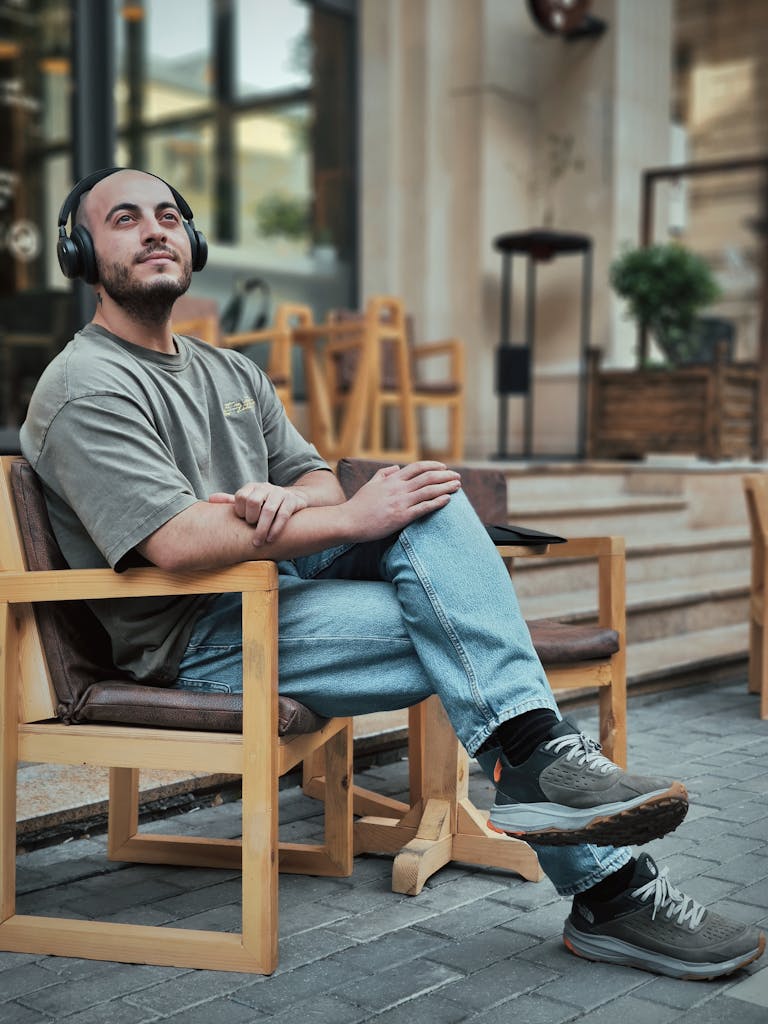 Man in Headphones Sitting